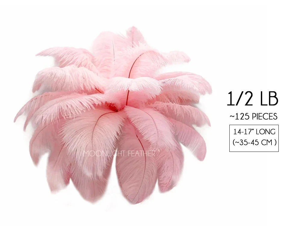 Bundle of 125 soft pink ostrich feathers, 14-17 inches long, for DIY crafts and decor.