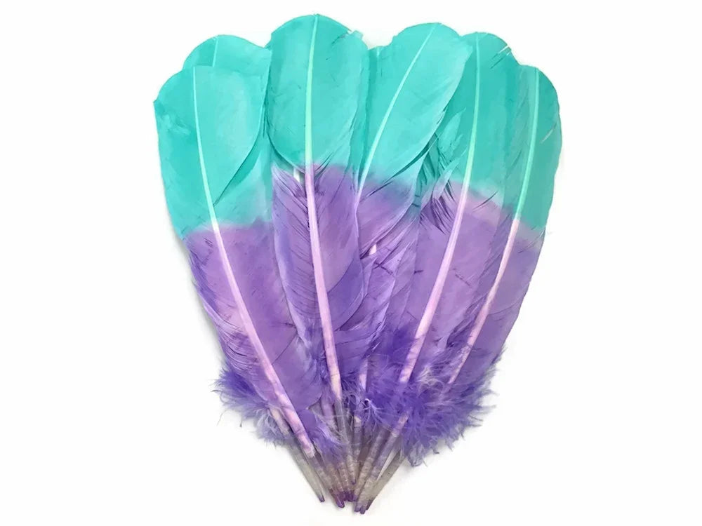 Vibrant teal and purple dyed feathers for DIY crafts and fashion accessories.