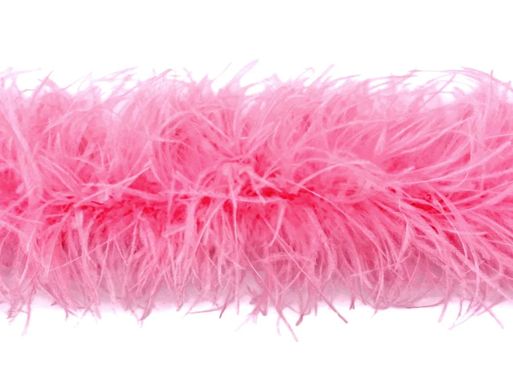 Soft pink feather boa for fashion accessories and DIY crafts.