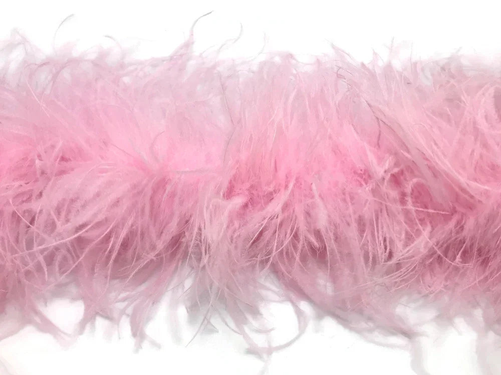 Soft pink feather boa for fashion accessories and DIY crafts.