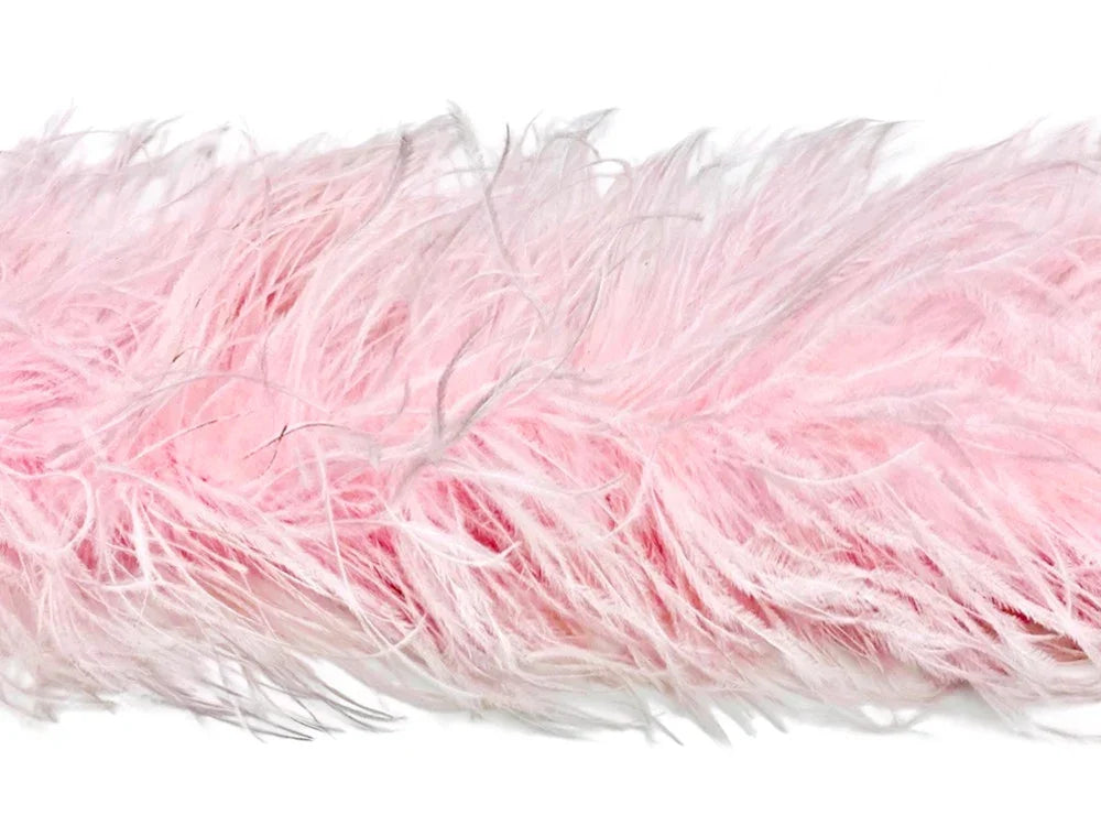 Soft pink ostrich feather boa for crafts, fashion, and DIY decor.