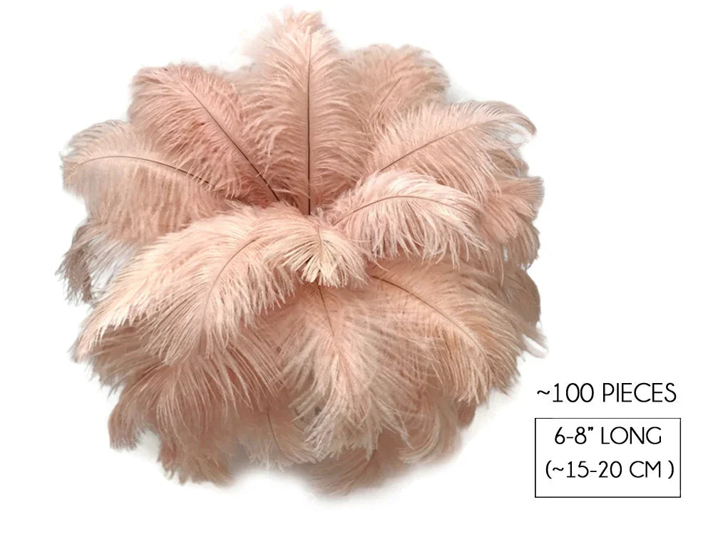 Bundle of 100 soft peach ostrich feathers, 6-8 inches long for DIY crafts and fashion decor.