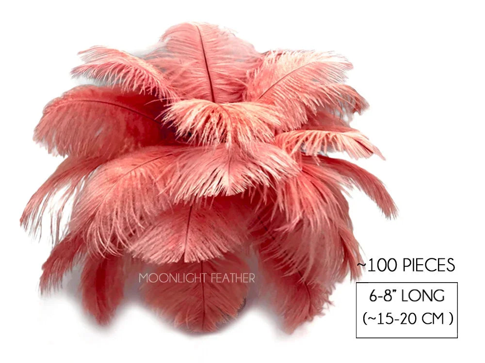 Bulk pack of 100 pink ostrich feathers, 6-8 inches long, for DIY crafts and fashion decor.