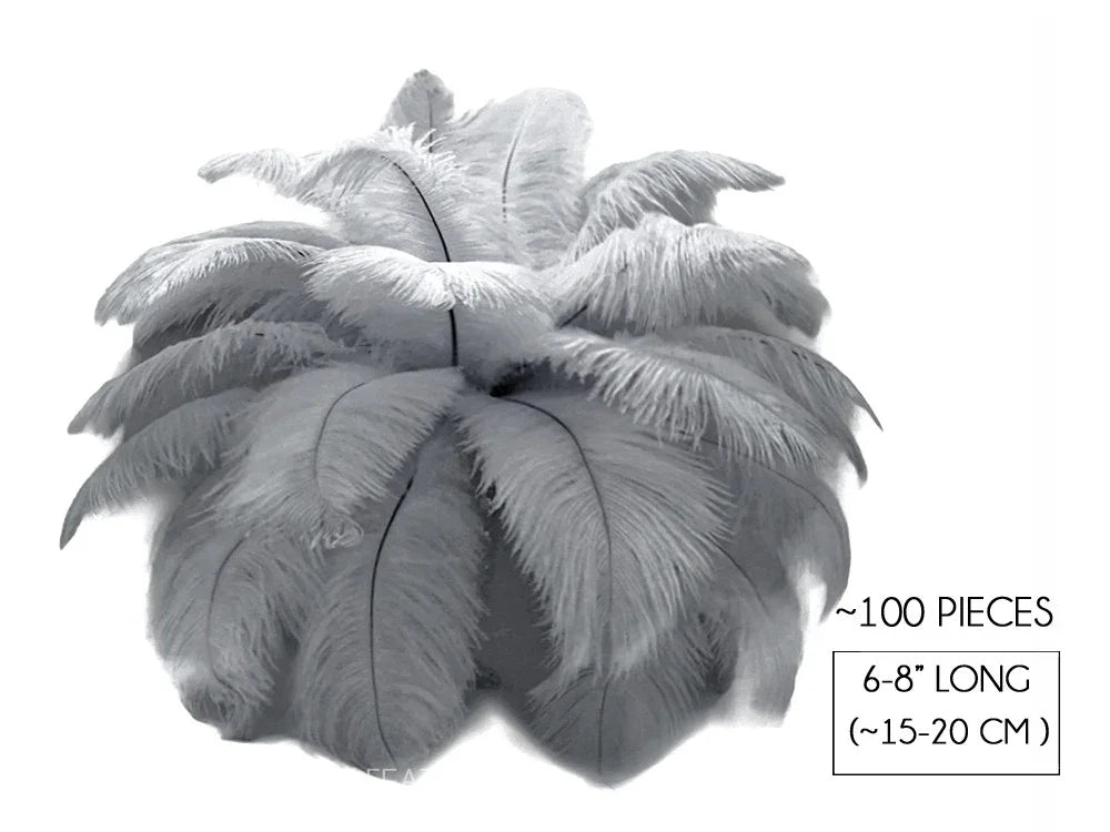 Bundle of 100 white ostrich feathers, 6-8 inches long for DIY crafts and fashion decor.