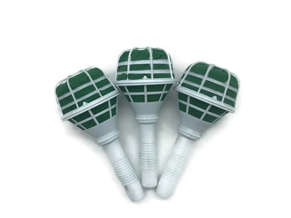 Three green feather quill holders with white plastic handles for craft DIY supplies.