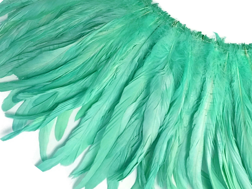 2.5 Inch Strip - 8-10" Mint Green Strung Natural Bleach & Dyed Coque Tails Feathers