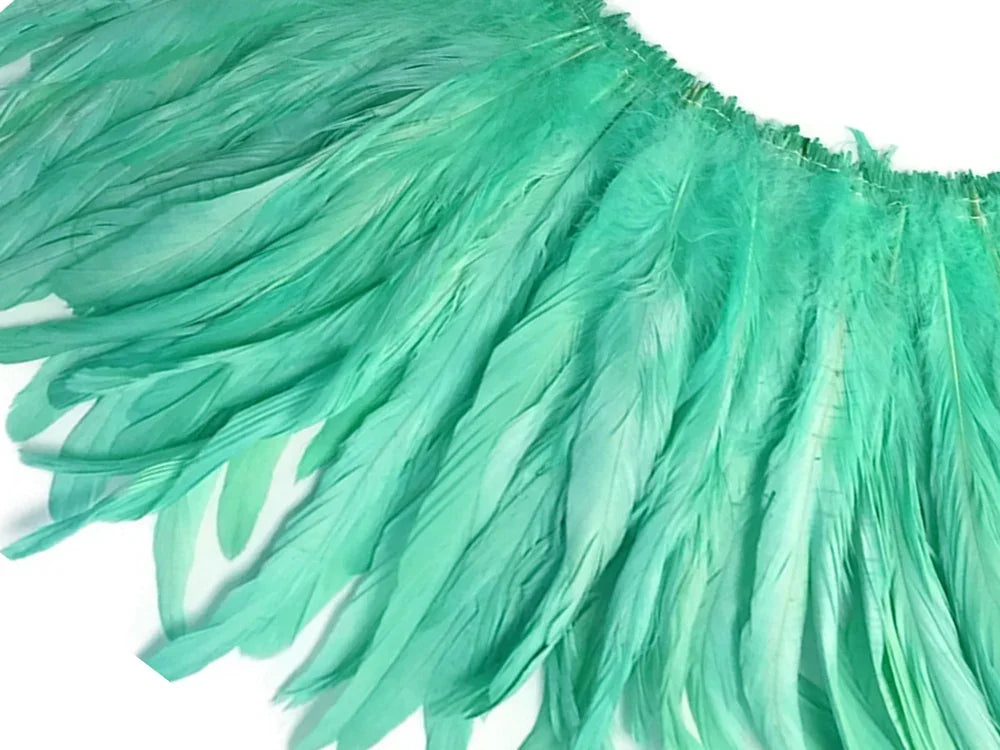 2.5 Inch Strip - 8-10" Mint Green Strung Natural Bleach & Dyed Coque Tails Feathers