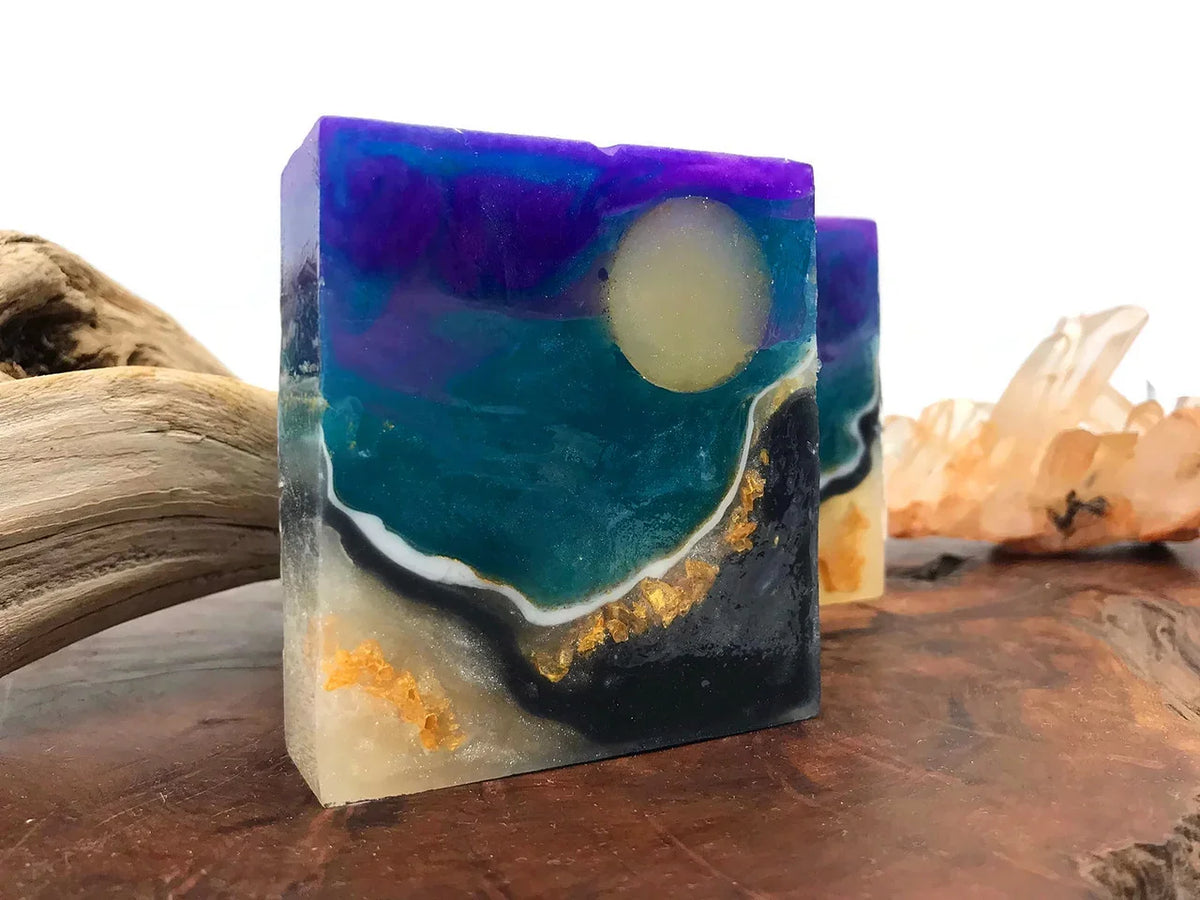 Celestial resin art block featuring a moon and starry night sky in purple and teal hues.