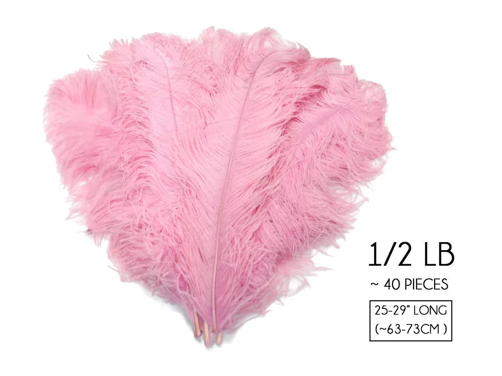 Bundle of 40 soft pink ostrich feathers, 25-29 inches long for crafts and fashion decor.