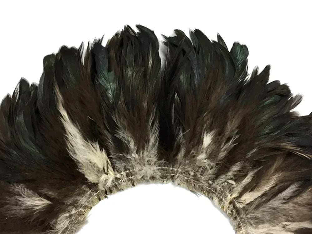 A decorative collar of dark brown and cream natural feathers sewn onto a band.