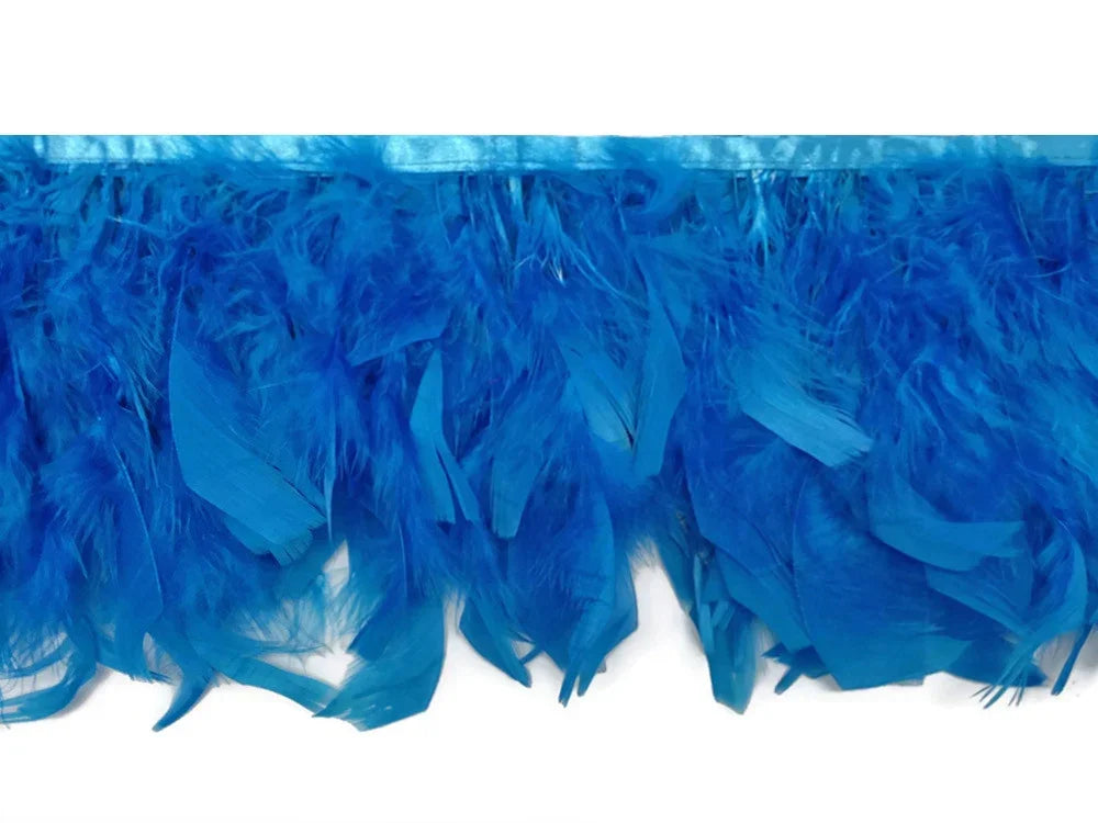 Vibrant blue feather boa trim for fashion crafts and DIY costume decor.