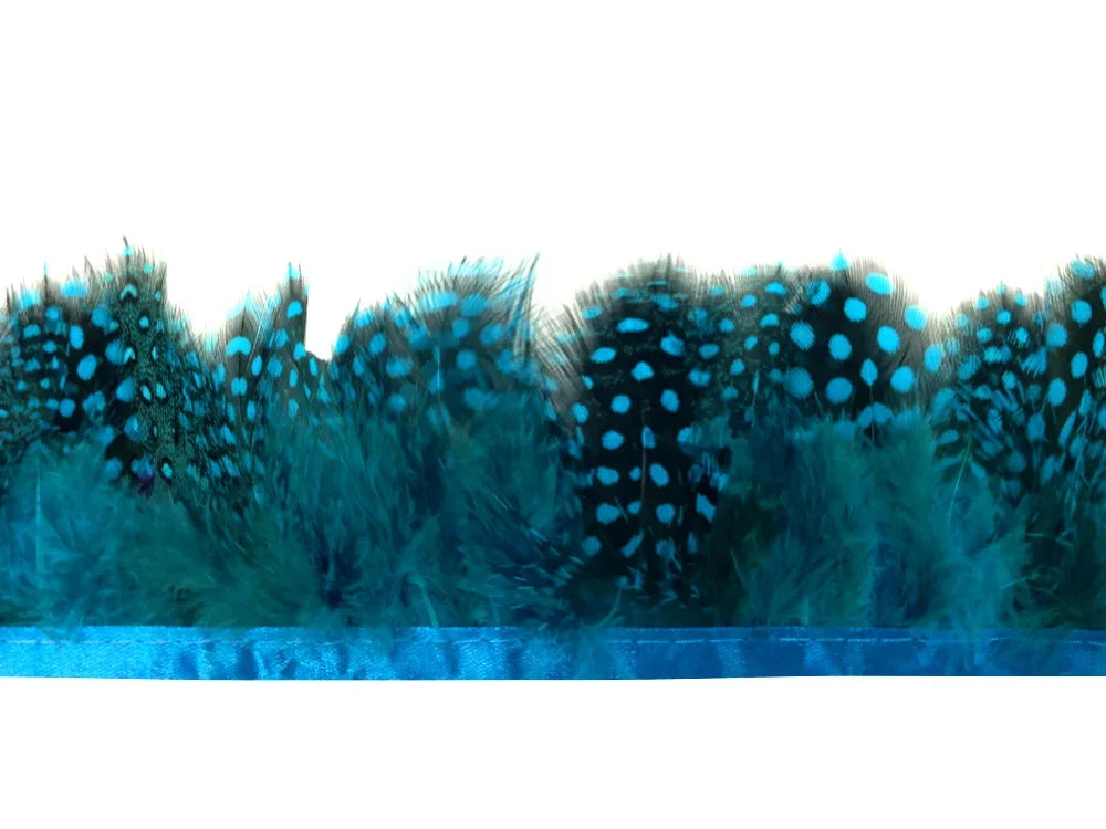 Teal blue spotted feather trim with ribbon base for crafts and fashion DIY.