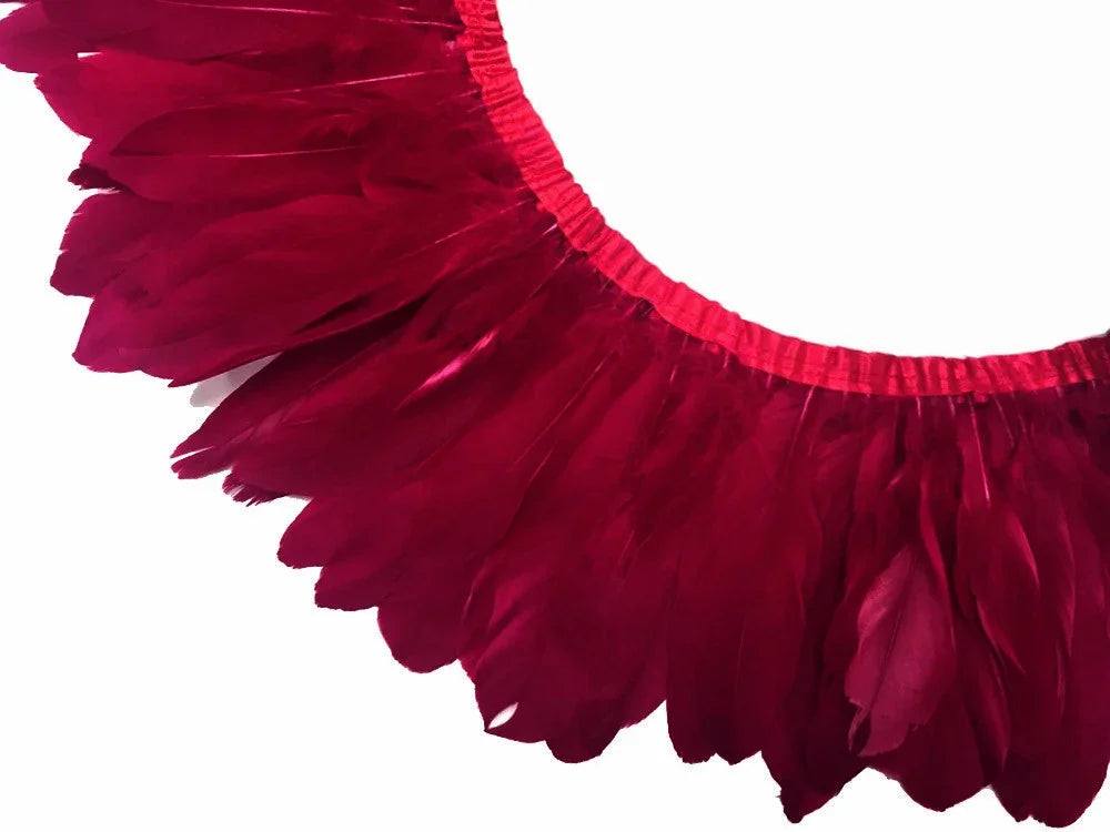 Vibrant red feather trim for DIY fashion, crafts, and costume decoration.