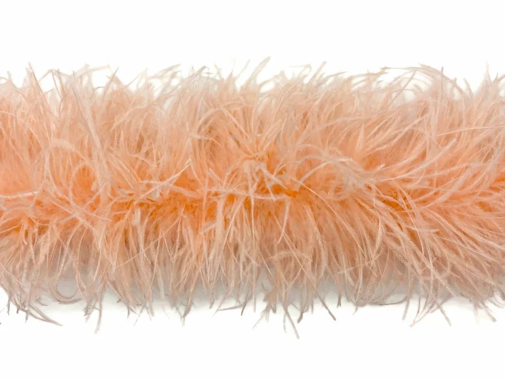 Peach colored fluffy feather boa for fashion and DIY craft decorations