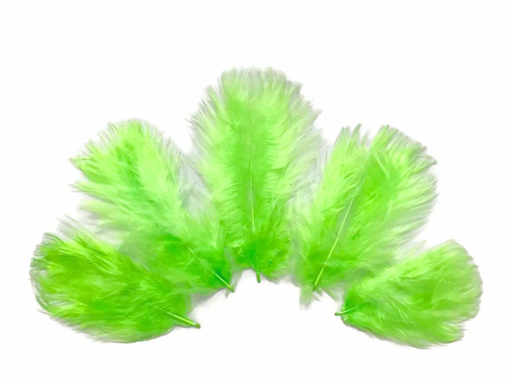 Five vibrant lime green craft feathers arranged in a fan shape on a white background.