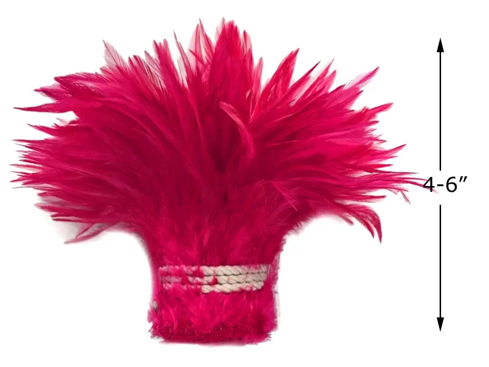 Vibrant hot pink feather hair accessory or craft supply, 4-6 inches long.