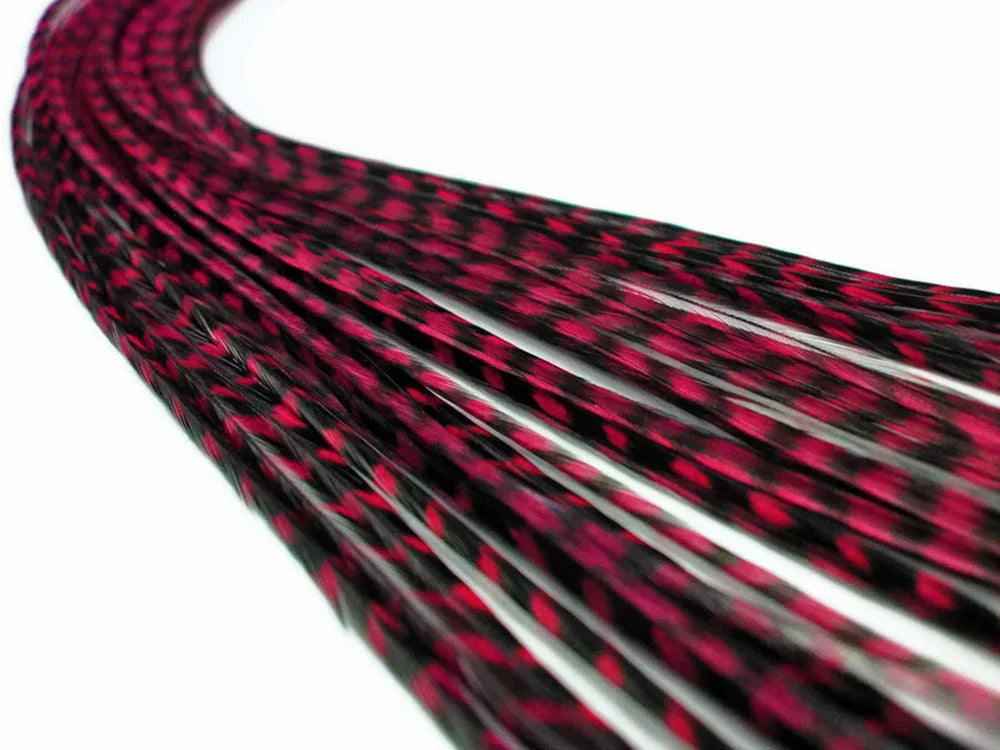 Red and black dyed synthetic hair extensions for creative hair styling and crafts.