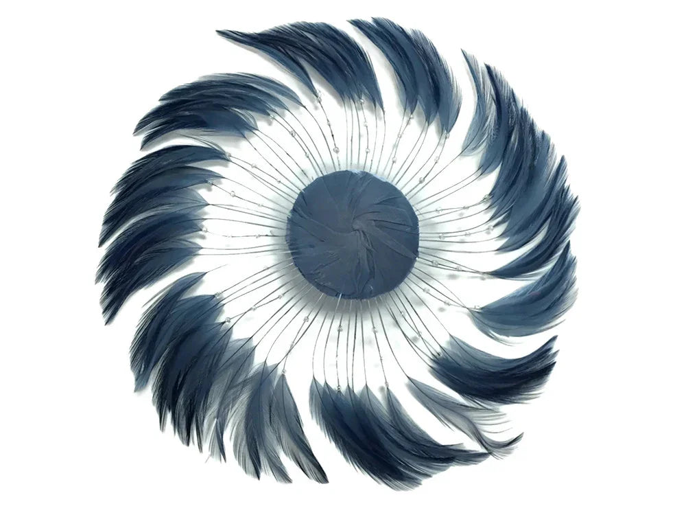 Circular arrangement of navy blue feathers for DIY crafts and fashion décor.
