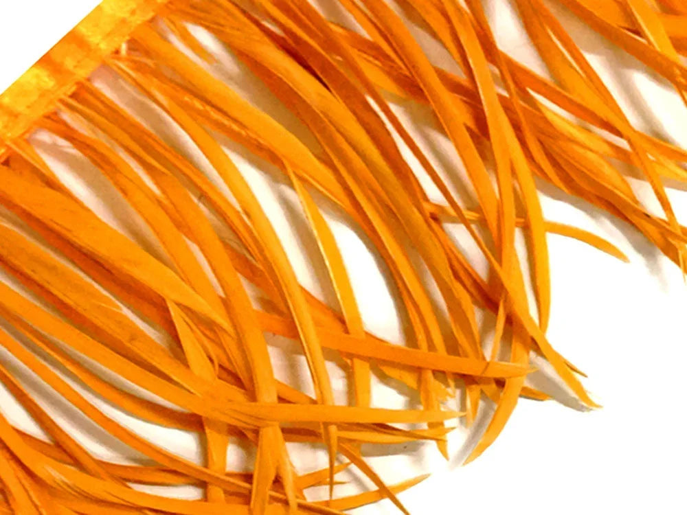 Vibrant orange feather fringe for fashion and DIY craft decorations.