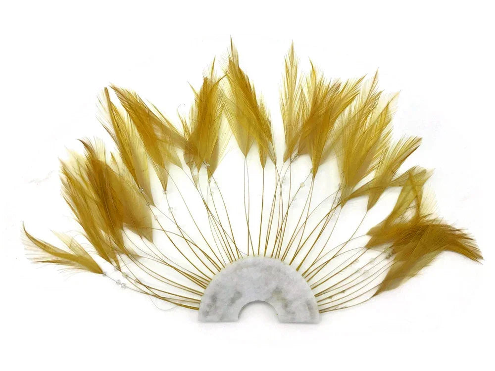 Golden dyed feathers arranged in a fan shape on a white semi-circle base for DIY crafts.