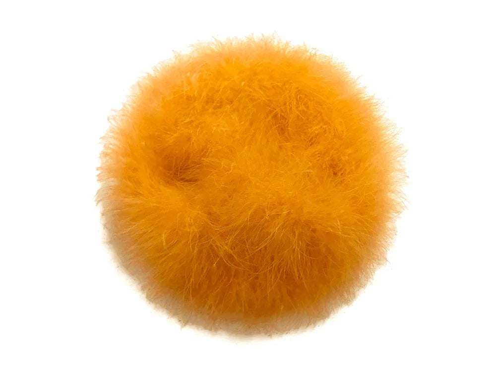 Fluffy bright orange faux fur pom pom for DIY crafts and fashion accessories