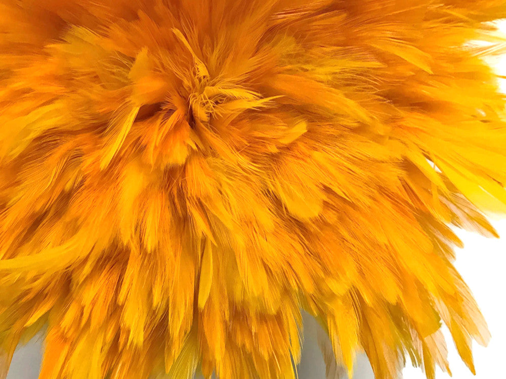 4 Inch Strip – 4-6” Dyed Golden Yellow Strung Chinese Rooster Saddle Feathers