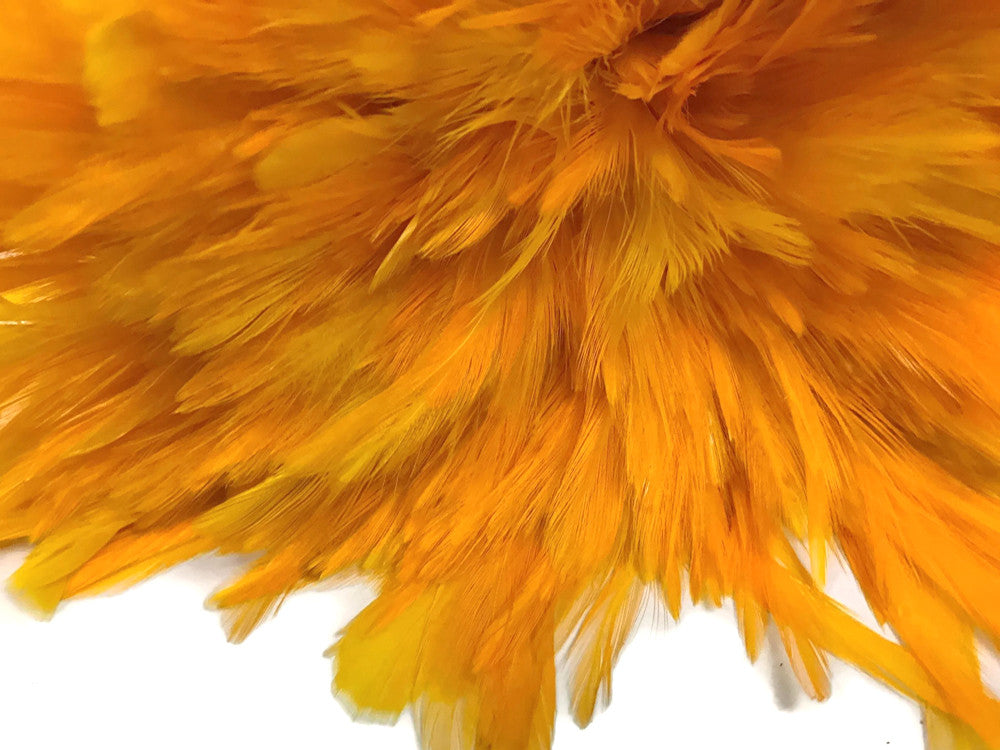 4 Inch Strip – 4-6” Dyed Golden Yellow Strung Chinese Rooster Saddle Feathers