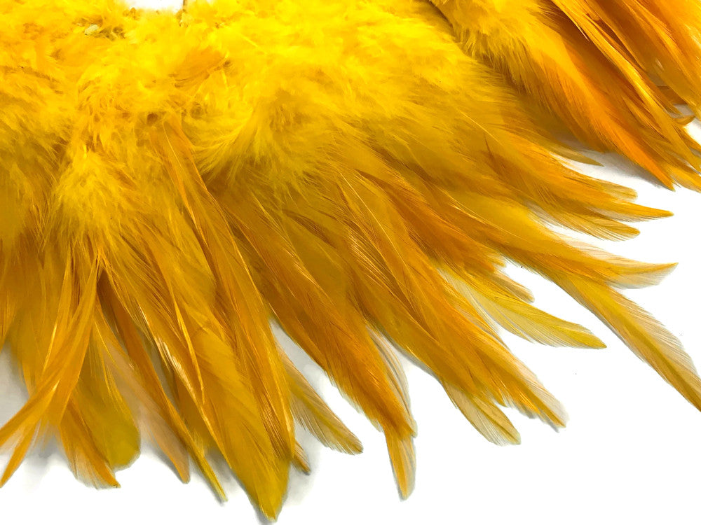 4 Inch Strip – 4-6” Dyed Golden Yellow Strung Chinese Rooster Saddle Feathers