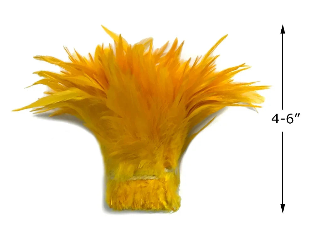 Bright yellow feather plume for crafts and fashion decor, 4-6 inches long.