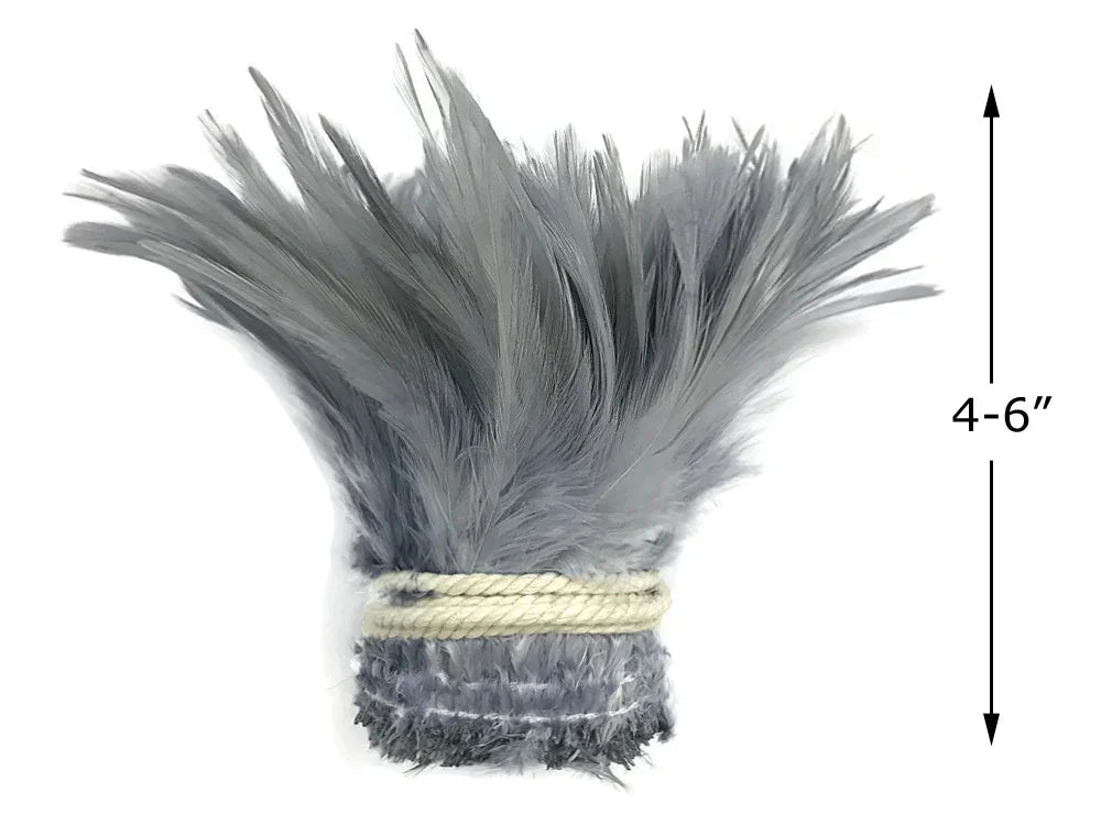 Bundle of grey craft feathers tied with twine, 4-6 inches long for DIY fashion and decor.