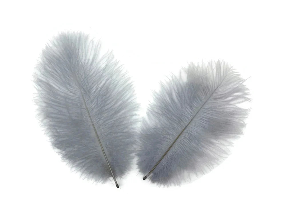 Two soft grey ostrich feathers for DIY crafts and fashion decor on a white background.