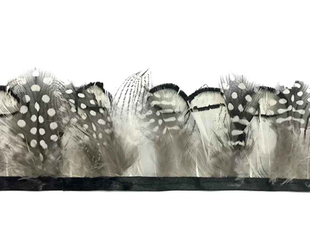 Black and white spotted feather trim for DIY crafts and fashion décor.