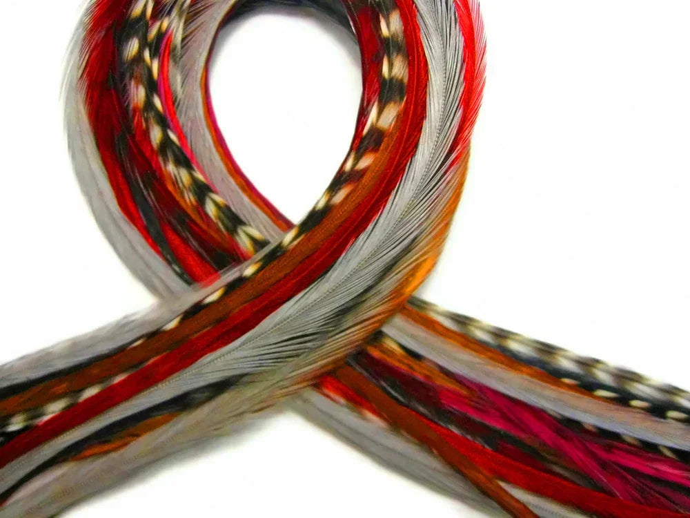 Assorted colorful craft feathers in red, orange, and patterned styles for DIY decor.