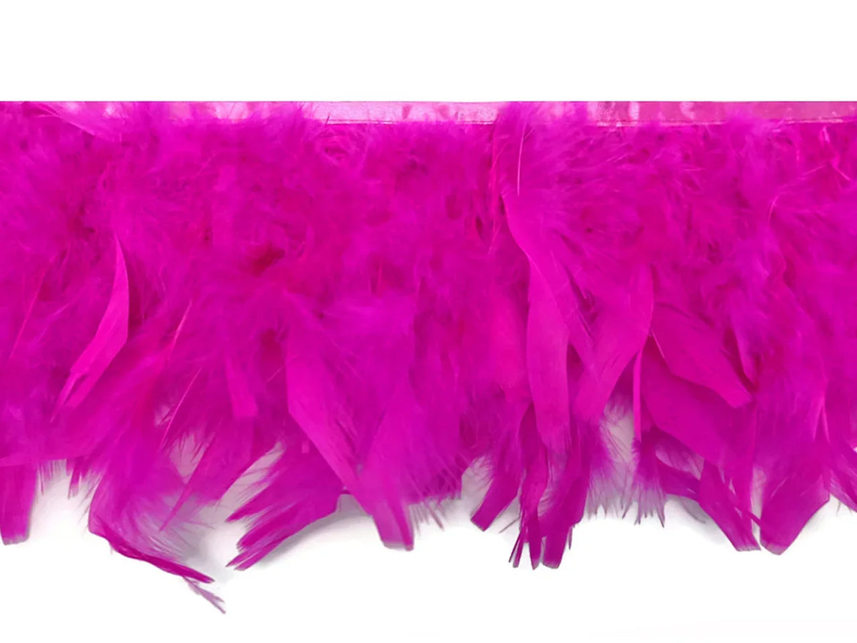 Vibrant hot pink feather boa trim for crafts and fashion accessories.