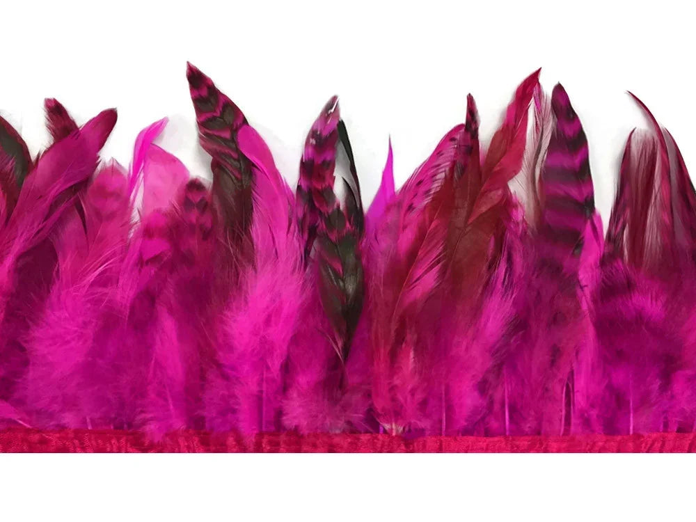 Vibrant hot pink feather trim with black striped accents for fashion and DIY crafts.