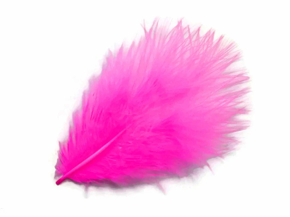 Vibrant neon pink craft feather for DIY fashion and decor accessories.