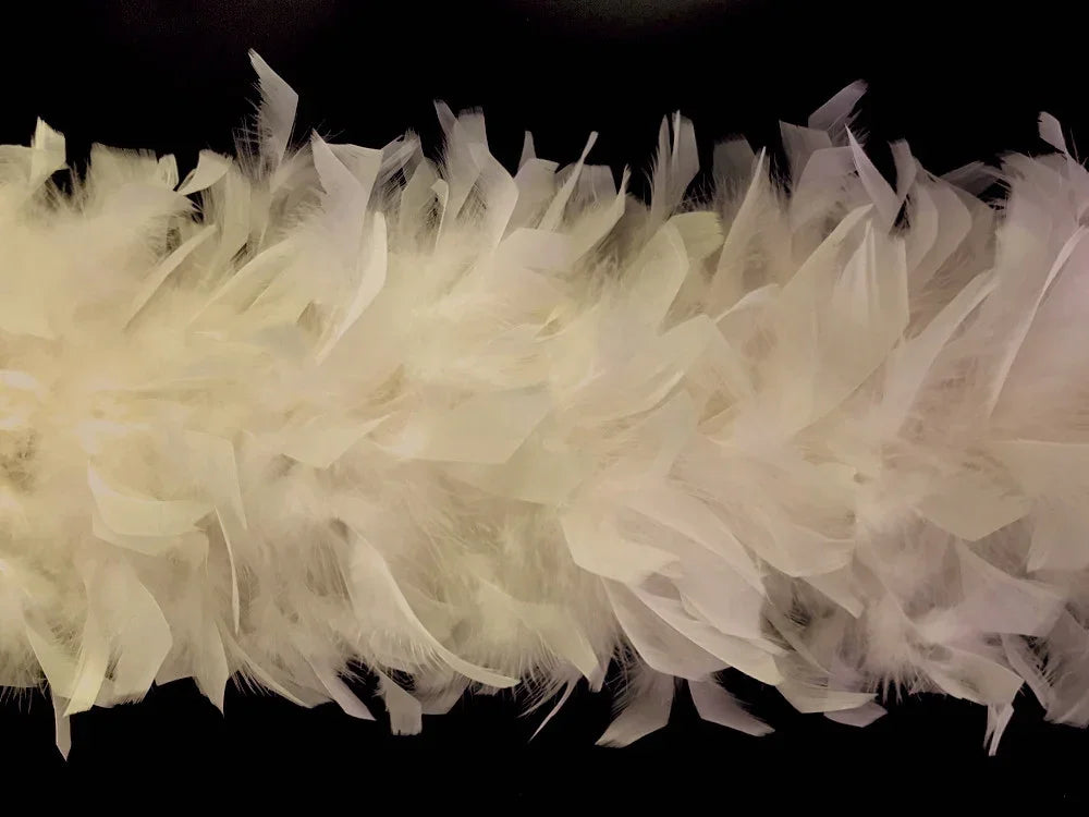 Soft white fluffy feathers for DIY crafts and fashion accessories.