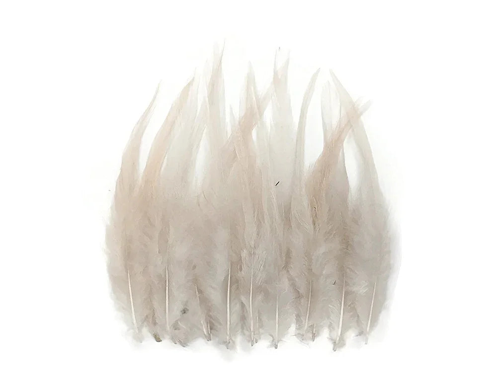 Soft cream-colored natural feathers for DIY crafts and fashion décor.