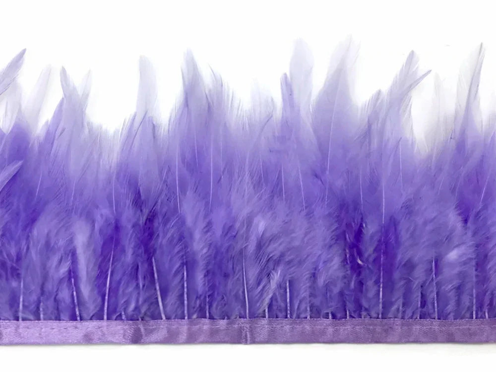 Vibrant purple feather trim strip for fashion crafts and DIY decor.