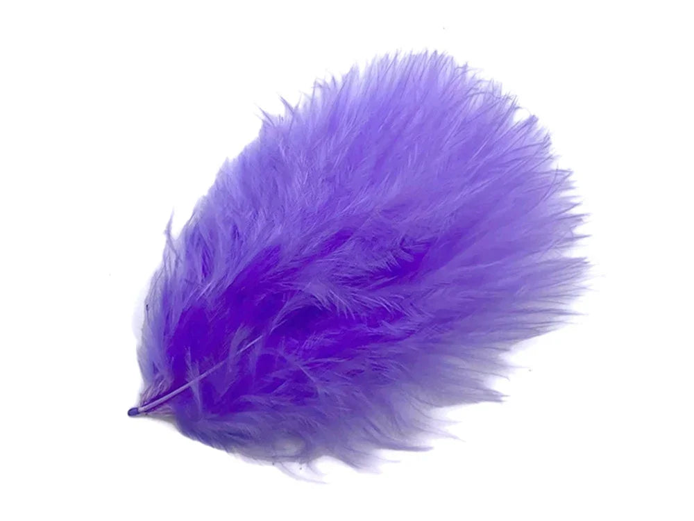 Vibrant purple dyed feather for DIY crafts, fashion accessories, and creative décor.