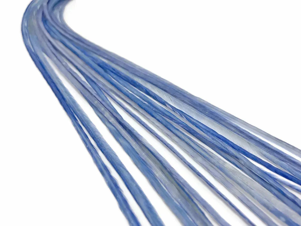 Long blue dyed feathers for DIY crafts and fashion accessories on a white background.