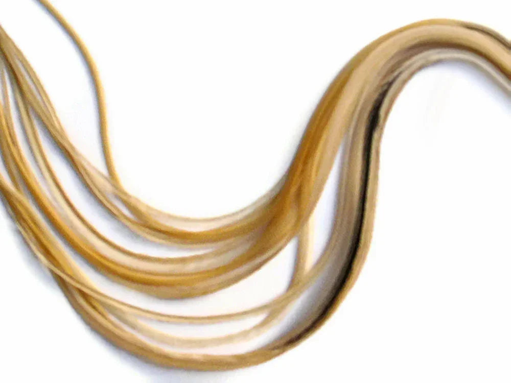 Natural golden brown decorative feathers for DIY crafts and fashion accessories.