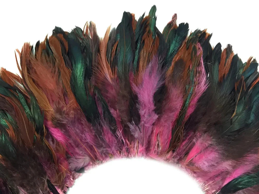 Vibrant multicolored feathers in pink, teal, and brown for DIY crafts and fashion decor.