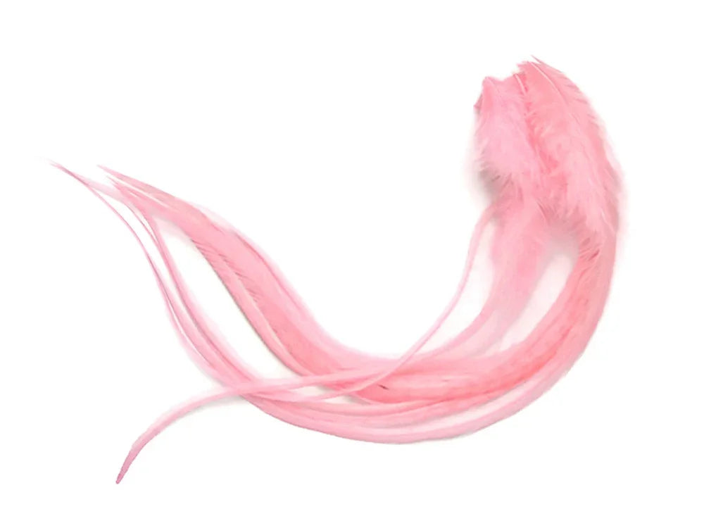 Soft pink ostrich feathers for DIY crafts and fashion accessories on a white background.