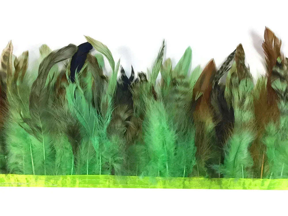 Assorted green and brown craft feathers attached to a lime green trim for DIY fashion and decor.