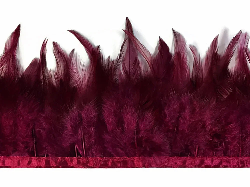 Deep burgundy ostrich feather trim for fashion and DIY crafts.