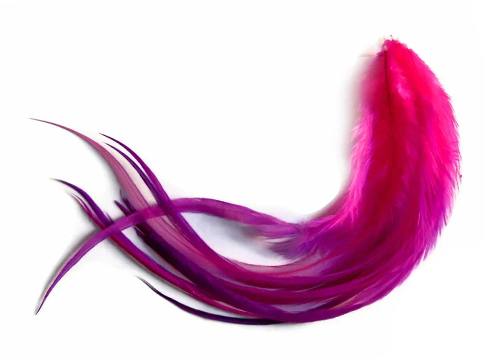 Vibrant pink and purple dyed feathers for DIY crafts and fashion accessories.