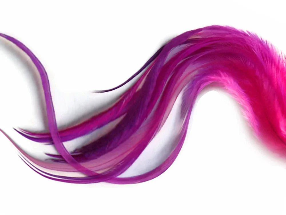 Vibrant pink and purple dyed feathers for DIY crafts and fashion decor.