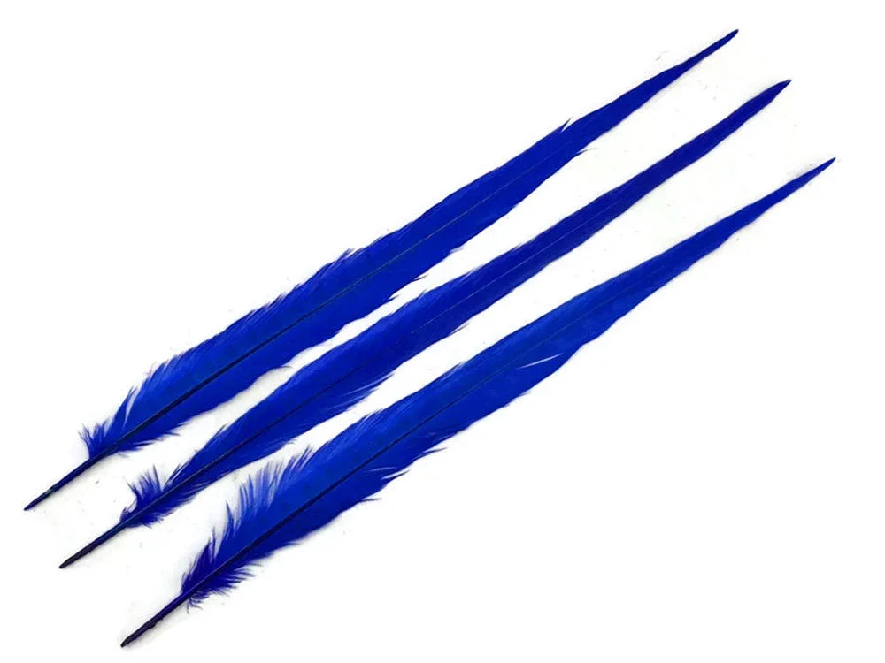 Three vibrant royal blue craft feathers for DIY fashion and décor on a white background.