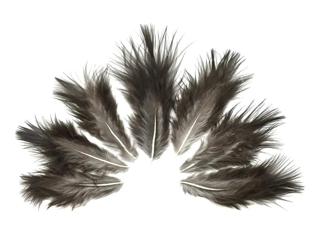 Set of soft dark grey decorative feathers for DIY crafts and fashion accessories.